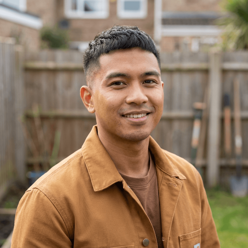 Michael Okafor, male auto care business owner in his late 30s, friendly professional demeanor